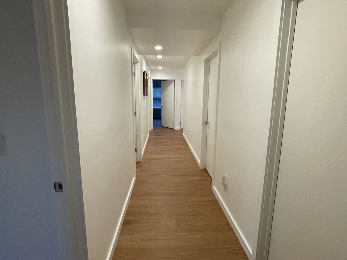 The quiet hallway between the resident rooms