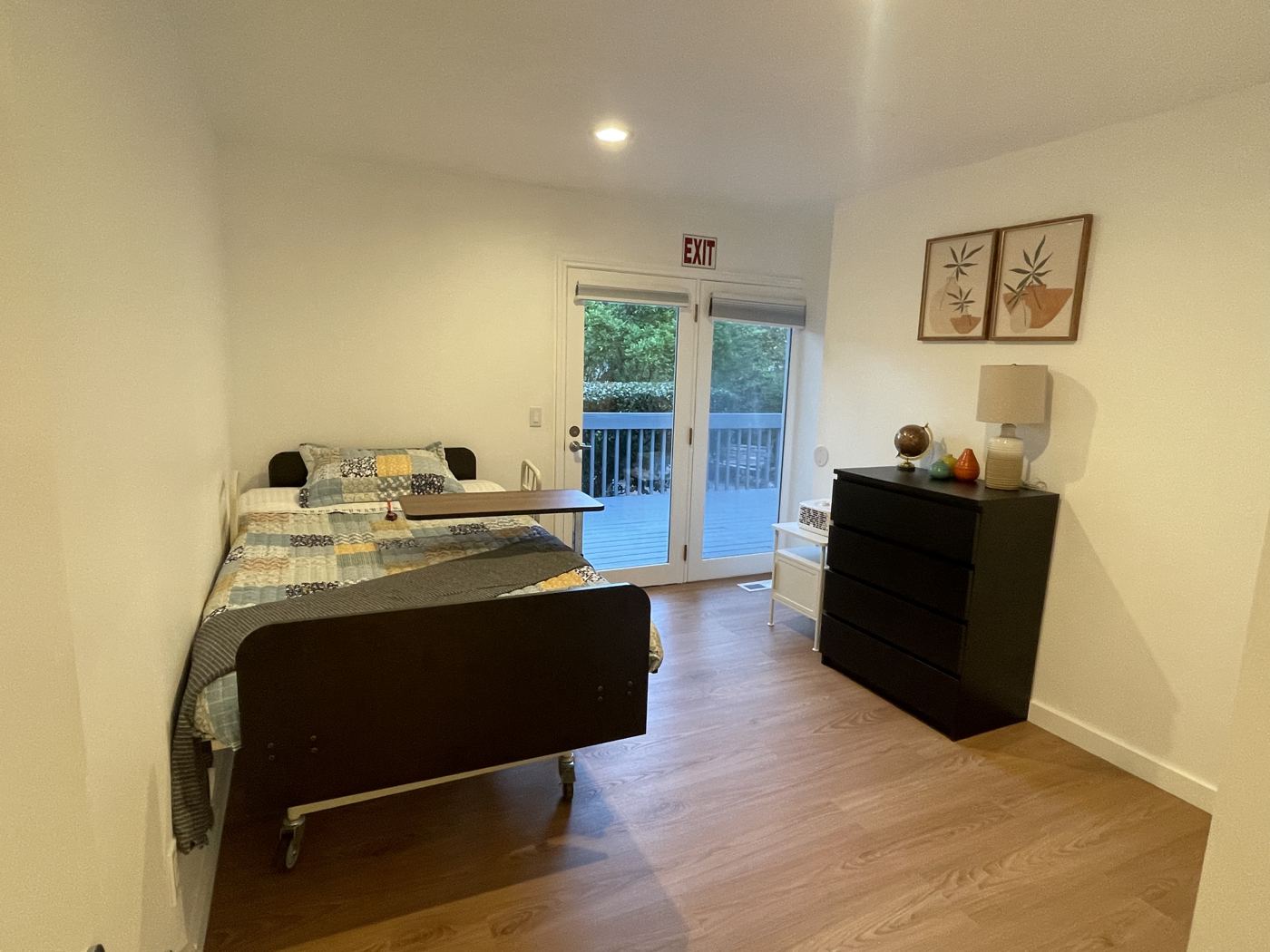 A resident room with a door to the garden
